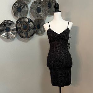 Black sparkly cut-out dress.